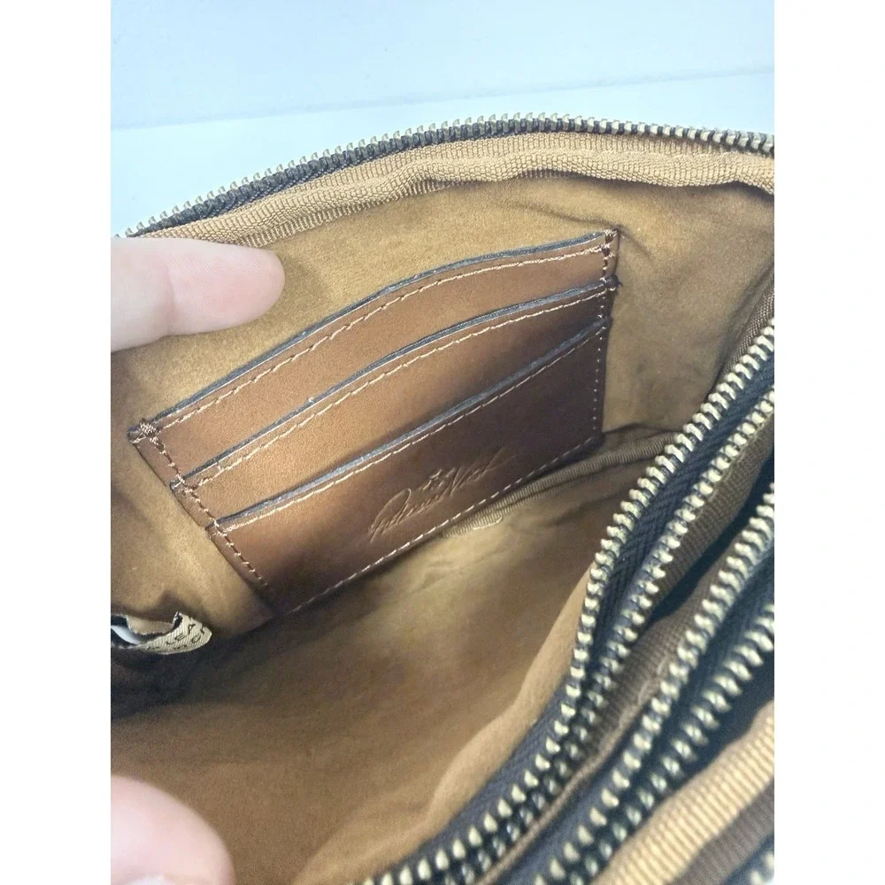 Patricia Nash Viani Leather Wristlet Riot Rust Signature Map